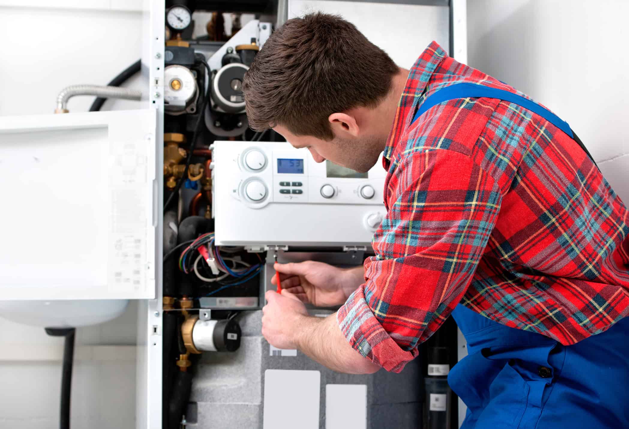 technician working on heater