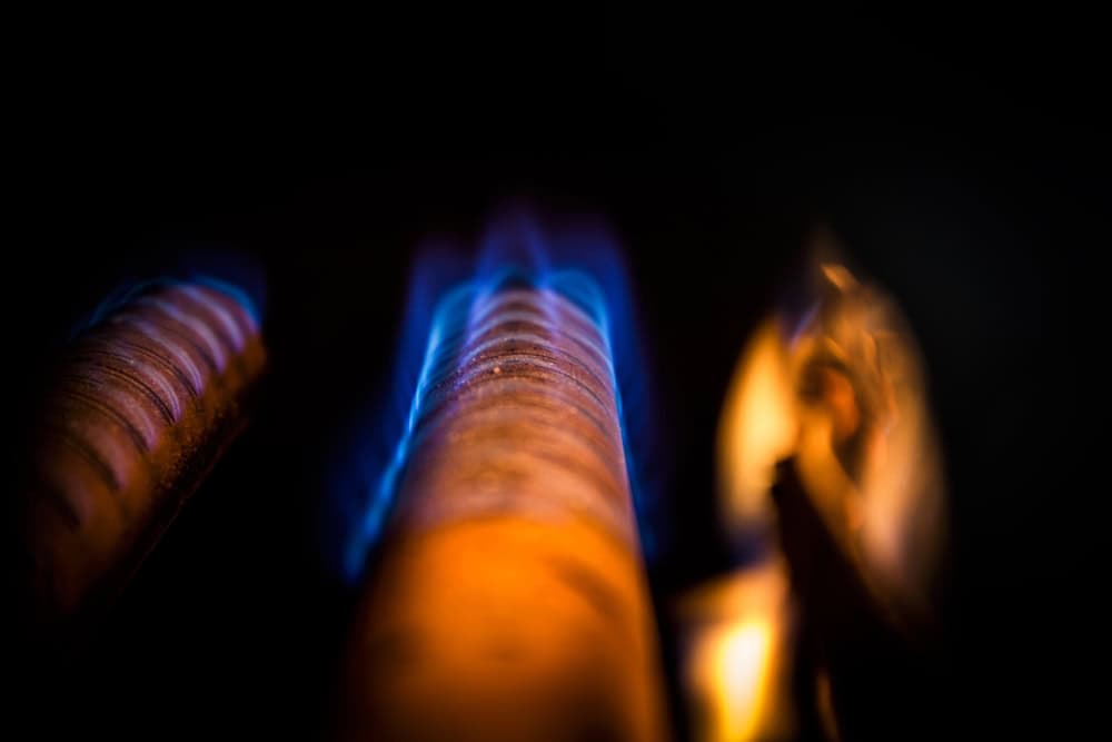 Gas furnace burner ignition showing blue flame during troubleshooting for a furnace that won’t kick on in Fort Mohave, AZ
